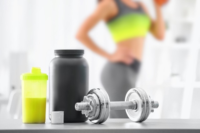 Muscular arm lifting weight